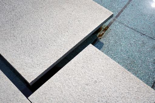モダンな石材と水辺のテクスチャ 石,石材,御影石の写真素材