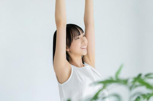 ストレッチをする若い女性 ストレッチをする若い女性 女性,美容,健康の写真素材