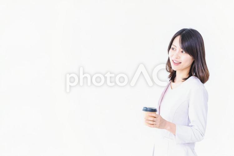 コーヒーを飲むビジネスウーマン 女性,スーパー,買い物の写真素材