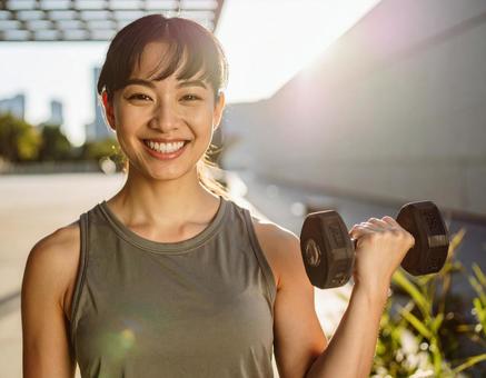 ダンベルを手にしたトレーニング準備 ダンベルを手にしたトレーニング準備の写真