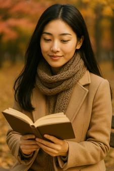 本を読む女性のポートレート秋ファッション 本を読む女性のポートレート秋ファッションの写真