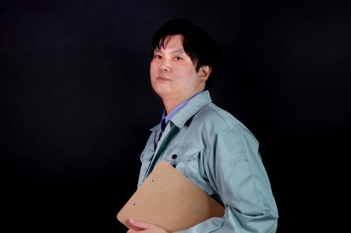 作業服を着た男性 作業服を着た男性 男性,作業服,人物の写真素材