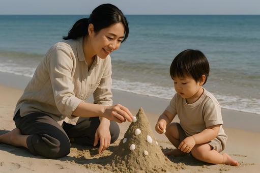 砂遊びする親子 砂遊びする親子の写真