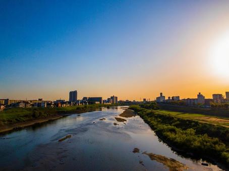 夕日と大和川 自然,夕日,風景の写真素材