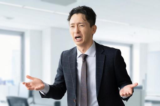 説明・抗議・弁解をする男性ビジネスマン 男性,ビジネス,ビジネスマンの写真素材