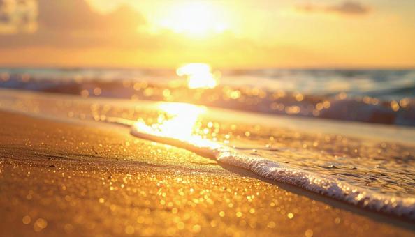 夕日の輝きと海辺の泡 夕日の輝きと海辺の泡の写真
