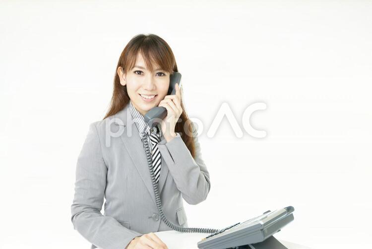 受話器を持つビジネスウーマン 女性,ビジネスウーマン,女の写真素材