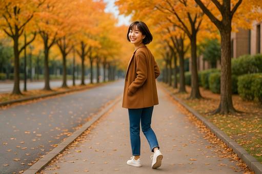秋の散歩女性 秋の散歩女性の写真