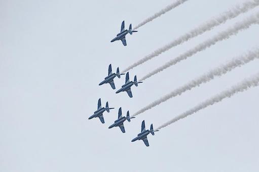 Blue Impulse flying through the cloudy sky, JPG Blue Impulse flying through the cloudy sky, JPG
