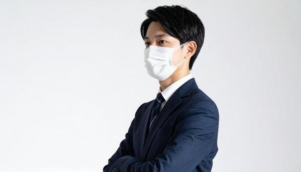 マスクをつける人 マスクをつける人の写真