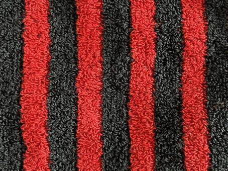 赤黒ストライプのタオル生地 タオル,生地,赤黒の写真素材