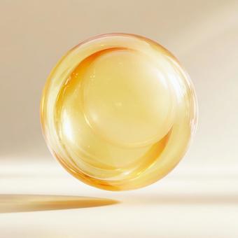 光を放つパステルイエローの抽象的な球体の写真