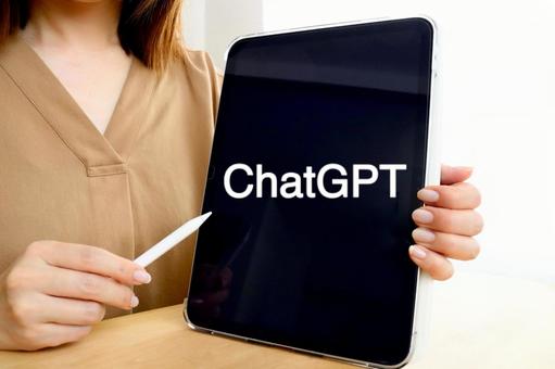 タブレットと女性　ChatGPTイメージ チャットgpt,chatgpt,チャットボットの写真素材