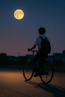 満月を見上げる自転車通学・学生・夕暮れ 満月を見上げる自転車通学・学生・夕暮れの写真