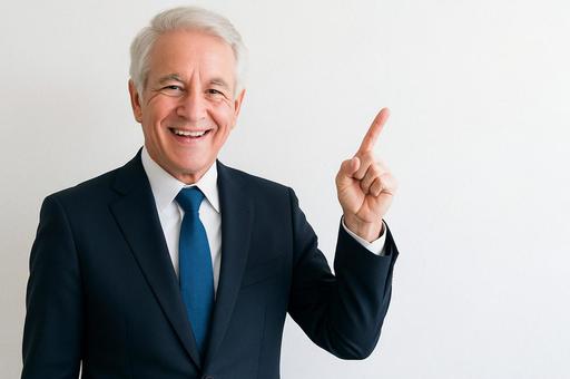 指を差してアドバイスする男性の写真