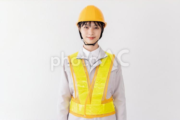 反射ベストを着た警備員　 女性,人物,日本人の写真素材