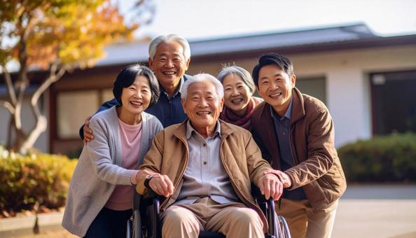 介護施設のシニア男性と見舞いに来た家族 介護施設のシニア男性と見舞いに来た家族の写真