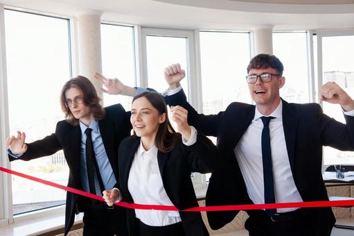 笑顔で喜ぶ男女3人 男女,外国人,ビジネスの写真素材