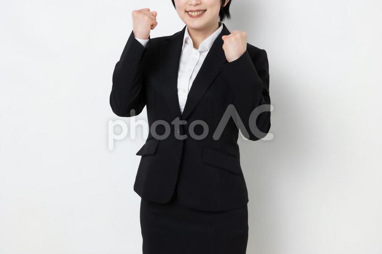 両手でガッツポーズしているビジネスウーマン（顔なし） 女,女子,ビジネスの写真素材