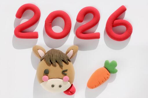 年賀状　馬　横 年賀状,馬,人参の写真素材