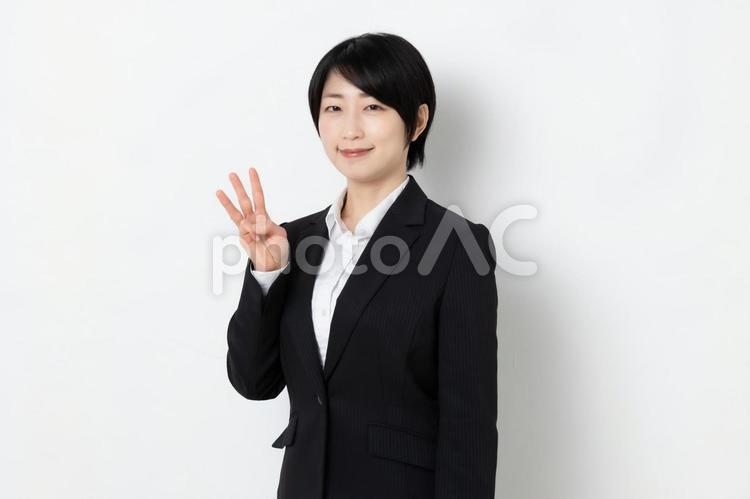 指を３本立てているビジネスウーマン 女,女子,ビジネスウーマンの写真素材