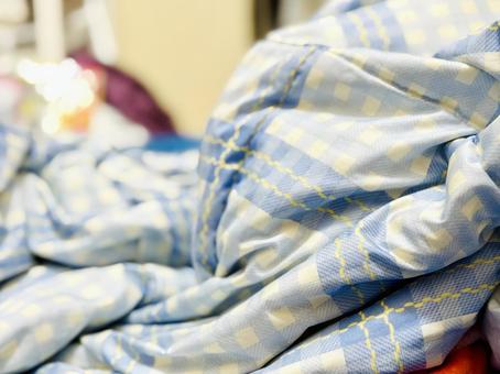 チェック模様の布団のアップ チェック模様の布団のアップ 布団,寝具,寝るの写真素材