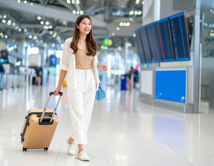 エアポートの彼女・出張に向かう エアポートの彼女・出張に向かうの写真