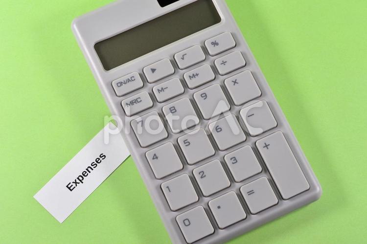 電卓とexpensesで経費のイメージ expenses,経費,費用の写真素材