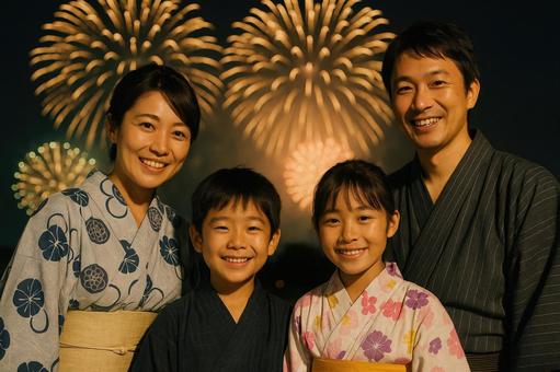 花火と家族の記念撮影 花火と家族の記念撮影の写真