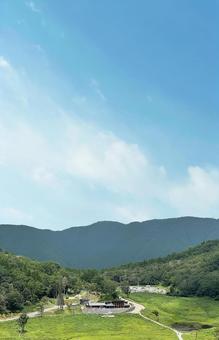 Vertical photo of beautiful mountains and meadows, JPG