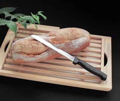 パン切りまな板とナイフ フランスパン パン切りまな板とナイフ フランスパン パン切り台,バゲット,トーストの写真素材