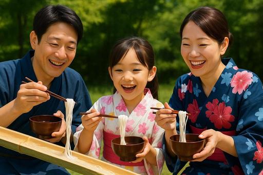 家族で流しそうめんを楽しむ・夏の風物詩 家族で流しそうめんを楽しむ・夏の風物詩の写真