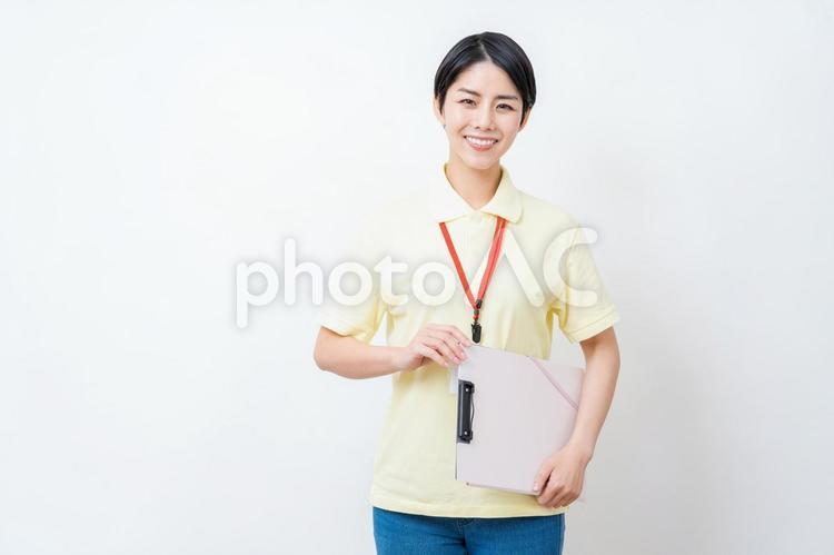 提案する介護福祉士の女性。 提案,介護,介護福祉士の写真素材