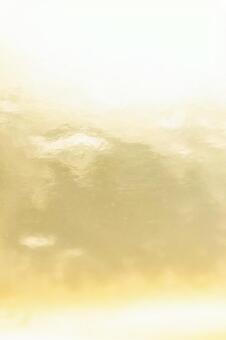 金色と光の背景 縦構図 金色,ゴールド,白の写真素材