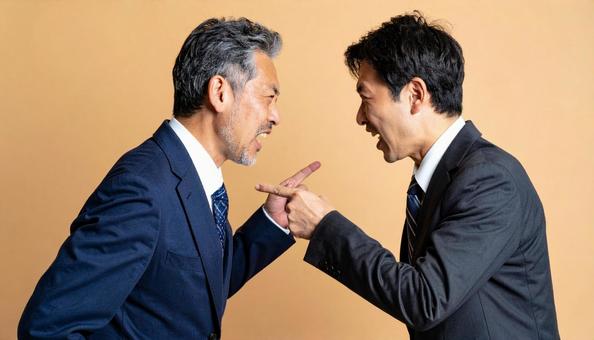 激しく言い争う中年男性たち(ビジネス) 激しく言い争う中年男性たち(ビジネス)の写真