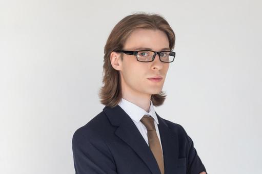スーツにメガネのカメラ目線の男性 男性,外国人,欧米人の写真素材