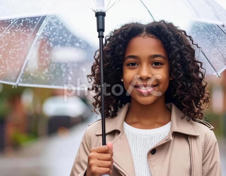 黒人の少女が傘を差す ai生成,黒人,少女の写真素材