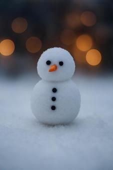 小さな雪だるま 小さな雪だるまの写真