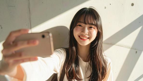 自撮りする女の子の写真