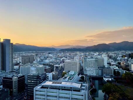 静岡市街地と山々の夕景 静岡市,葵区,新中町ビルの写真素材