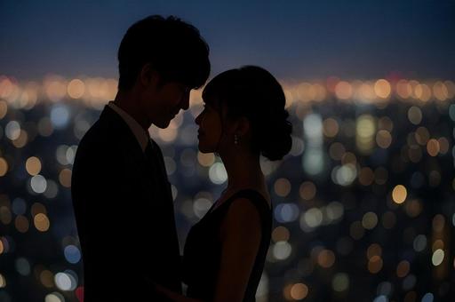 夜景に寄り添うカップル・シルエット・恋愛 夜景に寄り添うカップル・シルエット・恋愛の写真