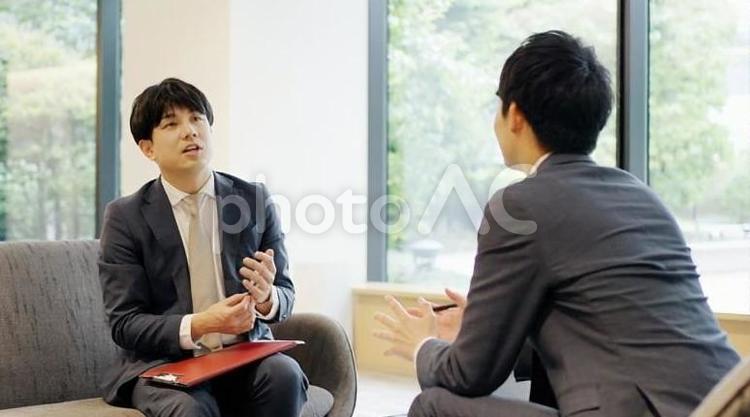 打ち合わせをするビジネスパーソン 打ち合わせ,アドバイス,助言の写真素材