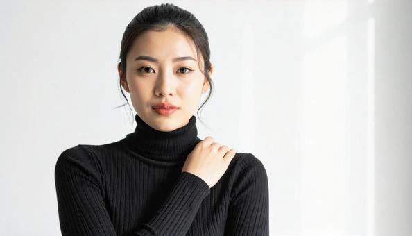 タートルネックを着た若い女性 タートルネックを着た若い女性の写真