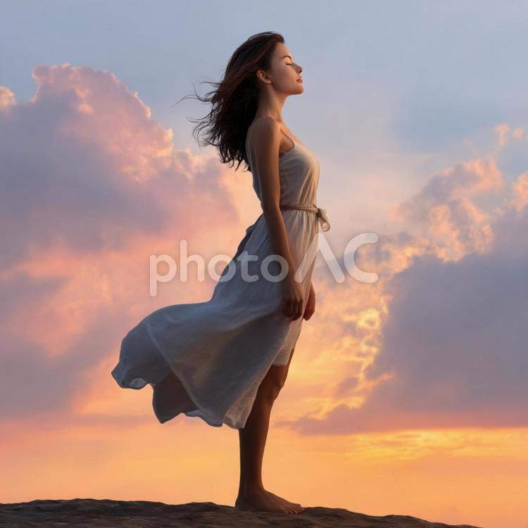 平和と希望を感じさせる幻想的なシーン 女性,若い女性,白いドレスの写真素材