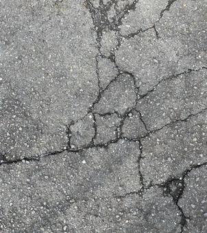アスファルトひび割れ アスファルトひび割れ ひび割れ,テクスチャ,シンプルの写真素材