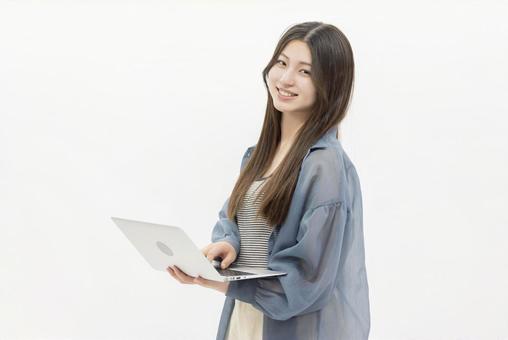 ビジネスウーマン ノートパソコン ビジネスウーマン ノートパソコン 女性,アジア人,笑顔の写真素材