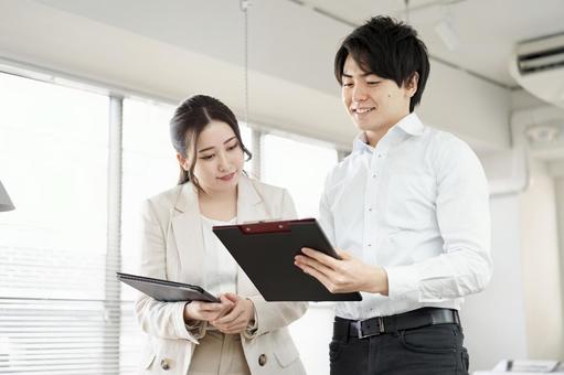 Business person explaining work procedure, JPG Business person explaining work procedure, male, female, businessman, JPG