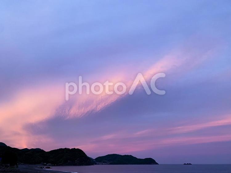 ビーチから見た水平線と夕空 海,空,夕景の写真素材