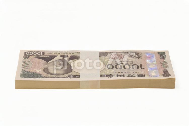 横アングルで撮影した新紙幣の100万円 新紙幣,一万円札,一万円の写真素材