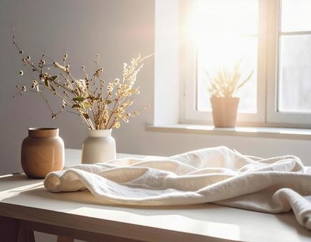 窓辺のナチュラルクロスとドライフラワーの写真